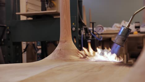 shot of a burn wood finish with a flamethrower