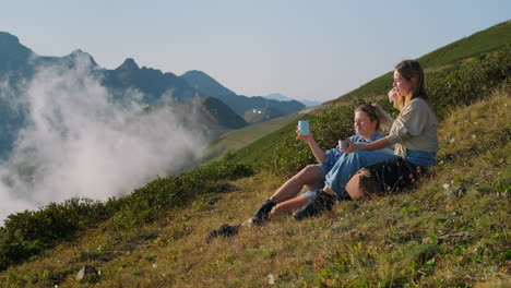 two friends enjoying a mountain view