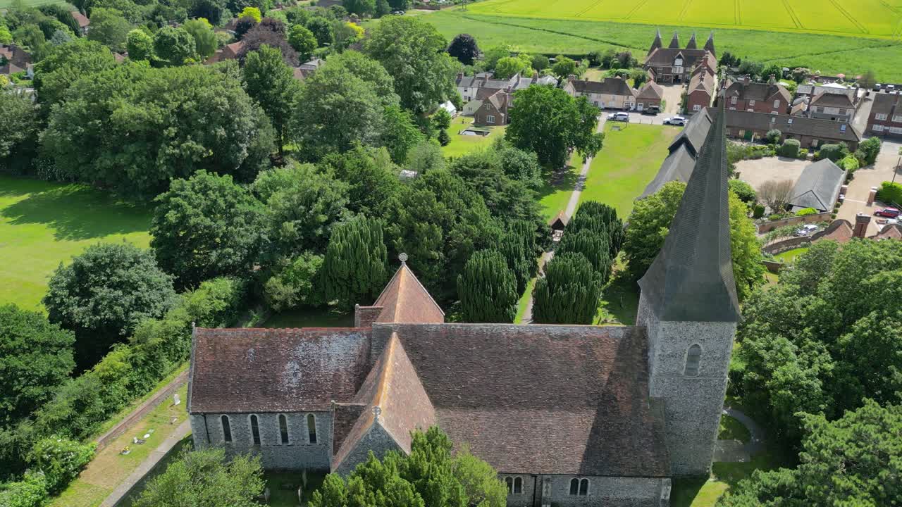 An aerial push-in over Ickham's St John the Evangelist church, with the village shown in the background
