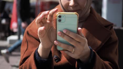 woman using a smartphone outdoors