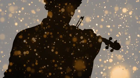 animación de puntos de luz que se mueven sobre la silueta de un hombre tocando el violín