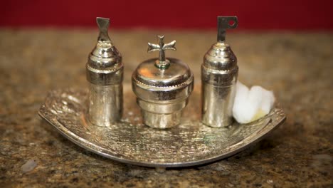silver holy oil stocks with engraved crosses for catholic baptism ceremony