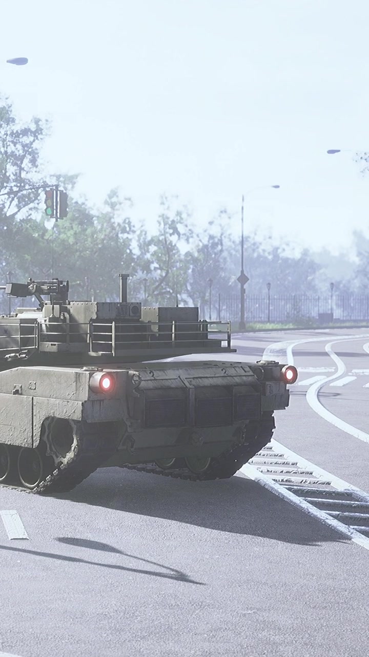 Military tank moving on a road in a city during daytime