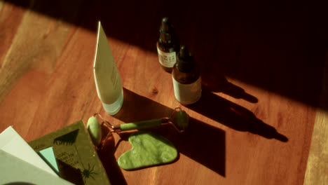 natural skincare routine with jade roller and serum