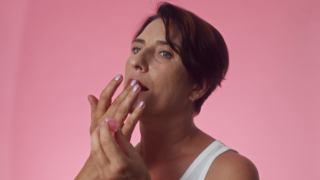 Middle-aged Woman Doing Lip Mask