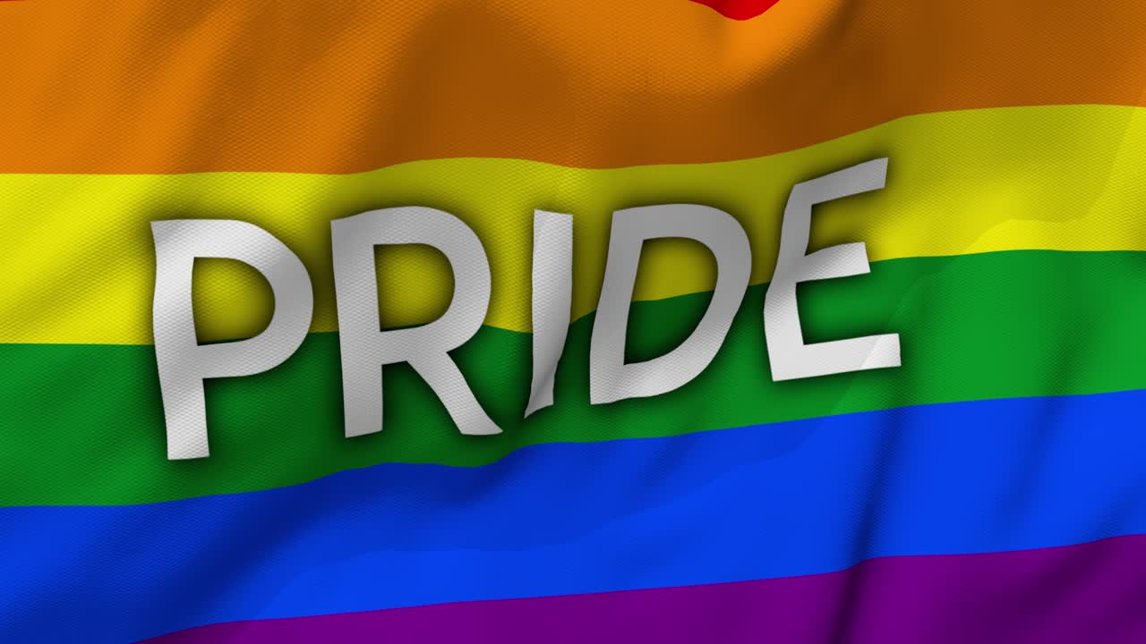 bandera del orgullo gay con el texto "orgullo", sopla en el viento en un primer plano