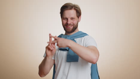 man showing hashtag symbol with hands, likes tagged message, popular viral social media content