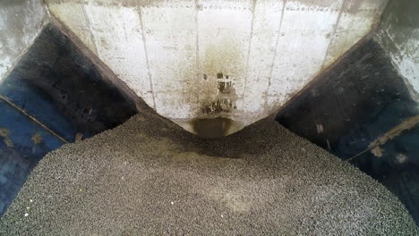 basement premise for charcoal storage at the up-to-date grain processing plant. close look at the charcoal with gradual rising over the basement.