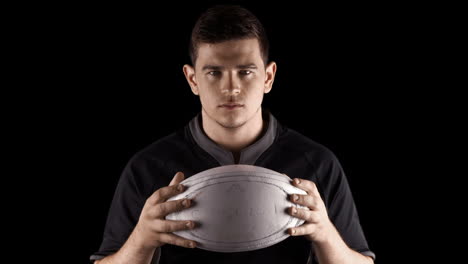 Serious-rugby-player-with-ball