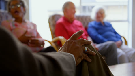 group of mixed race senior friends interacting with each other at nursing home 4k