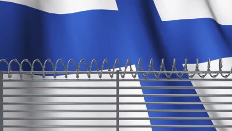 Barbed-wire-fence-against-waving-Finland-flag