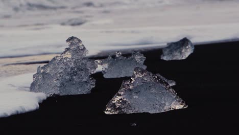 slow motion shots of blue icebergs on diamond beach in iceland