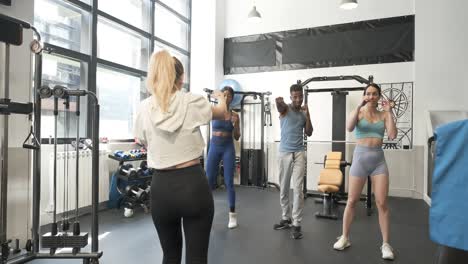 group fitness training session in gym