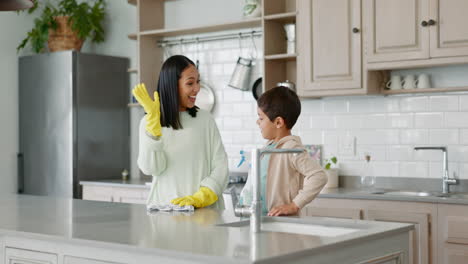 mother, high five or child washing dishes