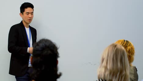 businessman giving presentation in conference room 4k