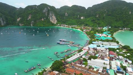 beautiful bay scene of ko phi phi islands, boats in marina, thailand