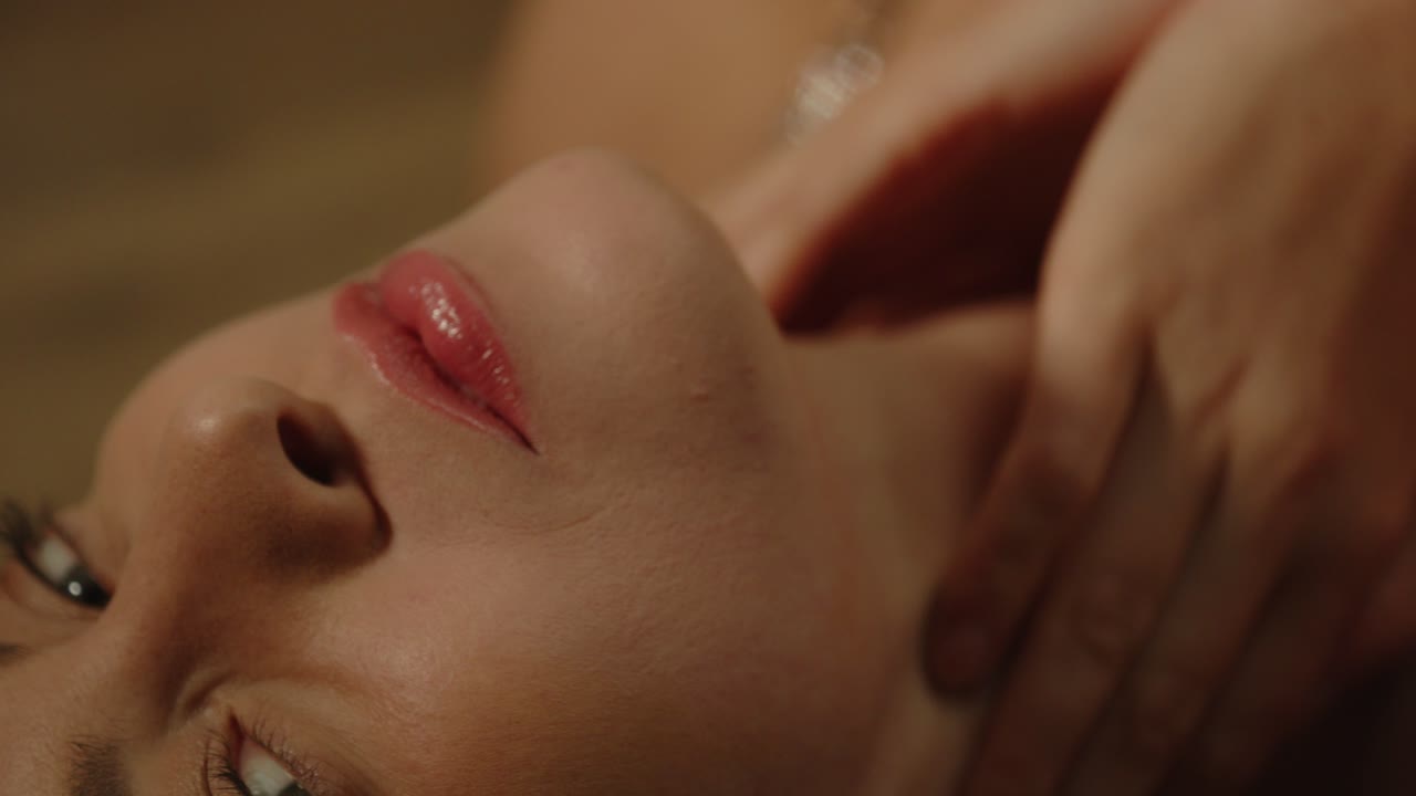 Beautiful macro portrait of an attractive woman sensually lying on the ...