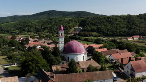 church in the famous hungarian gastro village in palkonya, hungary - aerial pullback