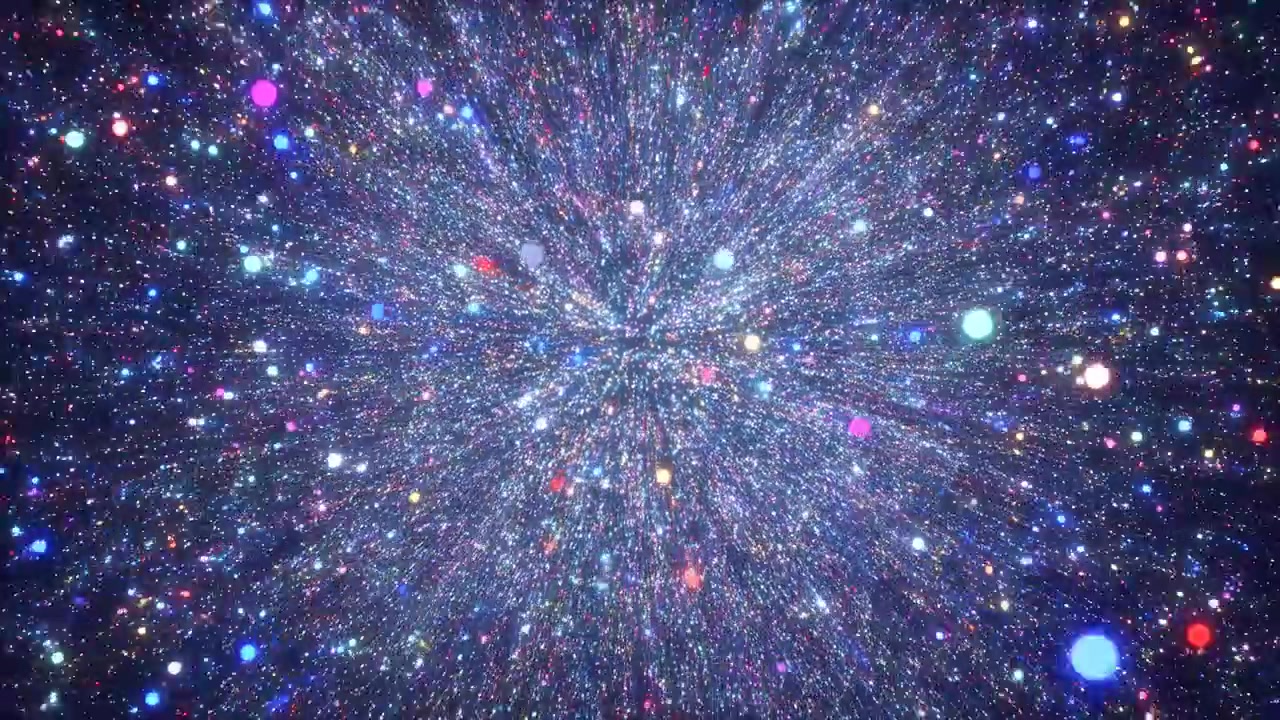 Abstract radial explosion of glowing multicolored particles against a dark background. Bright circular bokeh highlights and glittering specks concentrate near
