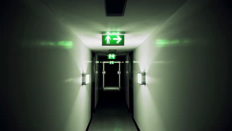 empty hallway at night with emergency exits