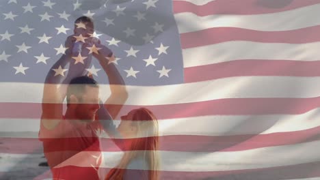 Caucasian-family-with-US-flag-waving-foreground