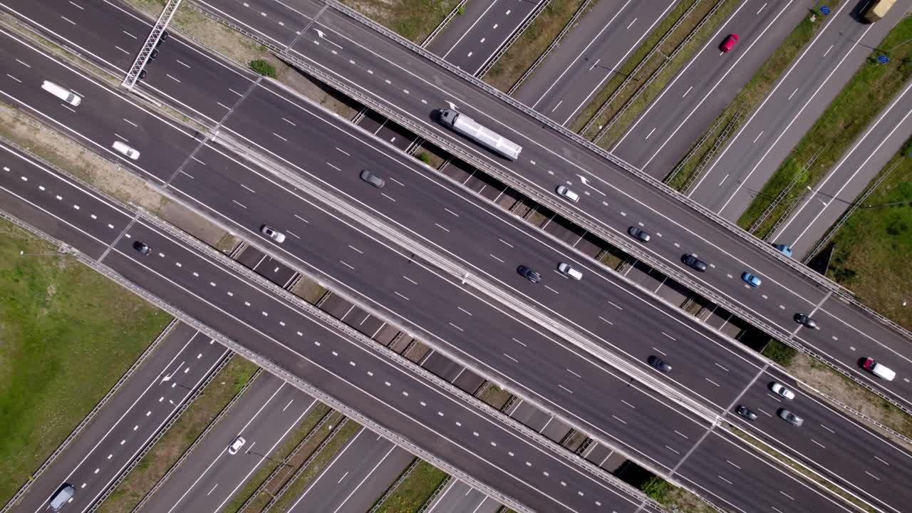 Aerial view of freeway junction intersection Voorst near Apeldoorn in Dutch landscape. Infrastructure and urban transportation in The Netherlands seen from above
