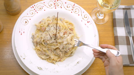 spaghetti with mushroom sauce and grated cheese, mediterranean