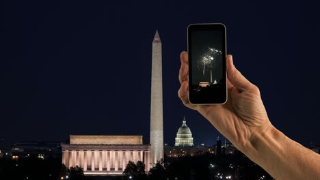 cinemagraph of fireworks in a smartphone video against washington dc background