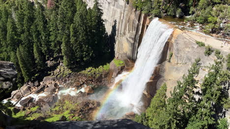 vernal fall and a rainbow from the spray in yosemite national park