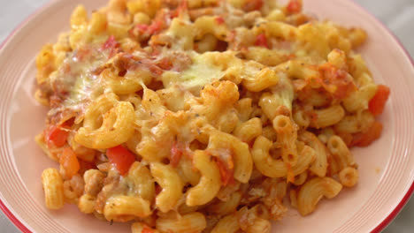 homemade baked macaroni bolognese with cheese - italian food style