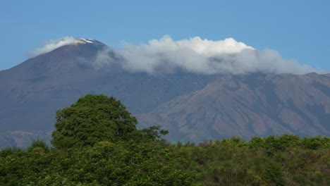 scenic shot of smoking mt. etna, volcano in sicily, italy