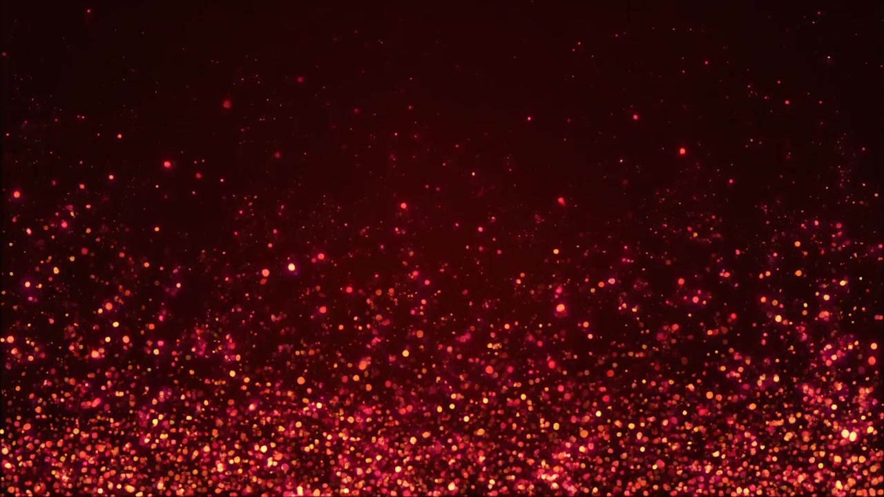 Particelle rosse astratte che fluttuano su sfondo scuro