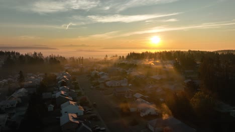rising drone shot of a suburban neighborhood on whidbey island during a cold winter morning