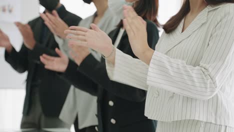 attendees were applauding and honoring the panelists at the business meeting.