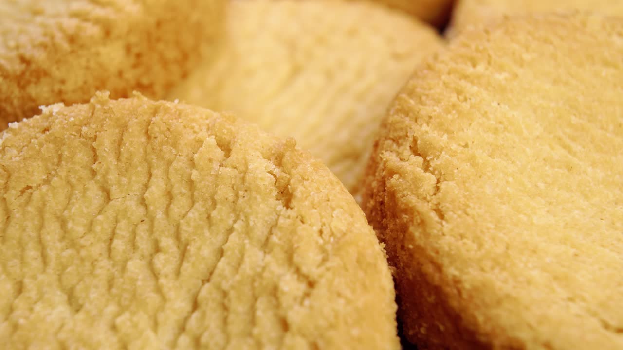 Baked shortbread cookie texture. Fresh round biscuits. Macro