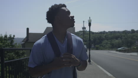 straight on shot of african american tourist walking in a new city stabilizer shot in 4k uhd