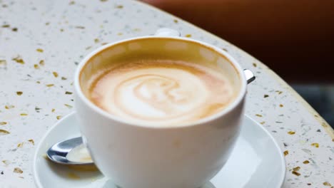 a cup of coffee with latte art