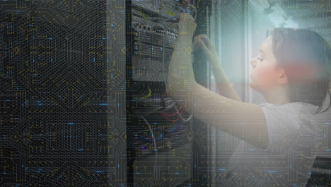 Woman-working-on-computer-server-while-glowing-motherboard-moves-in-foreground