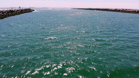 Drone-flies-low-over-Pacific-inlet