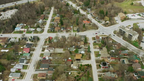 long residential roads in the suburbs lined with trees and homes