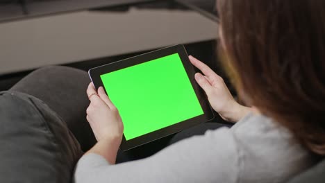 girl using digital tablet pc with blue screen