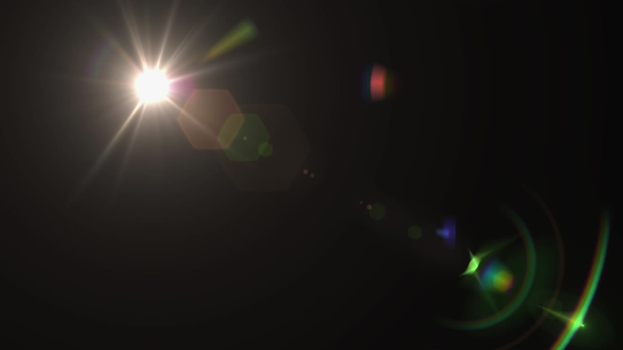 animación digital del punto de luz y el destello de la lente contra un fondo negro