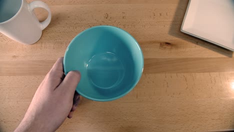 empty bowl removed and then placed on the table