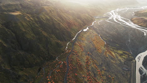 flyover above thorsmork river valley iceland in warm