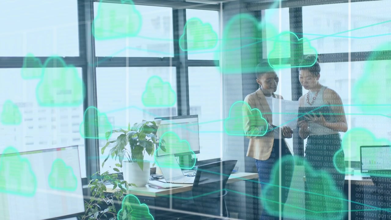 Two women team starting comparing paper tablet for cloud plan icons and streams crossing foreground