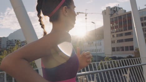 athlete running outside in the city on sunny day