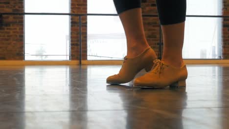 Woman-practicing-a-tap-dance