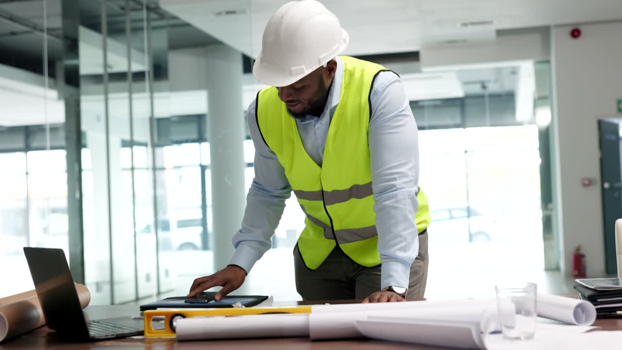 Planning, paperwork and talking architect on phone
