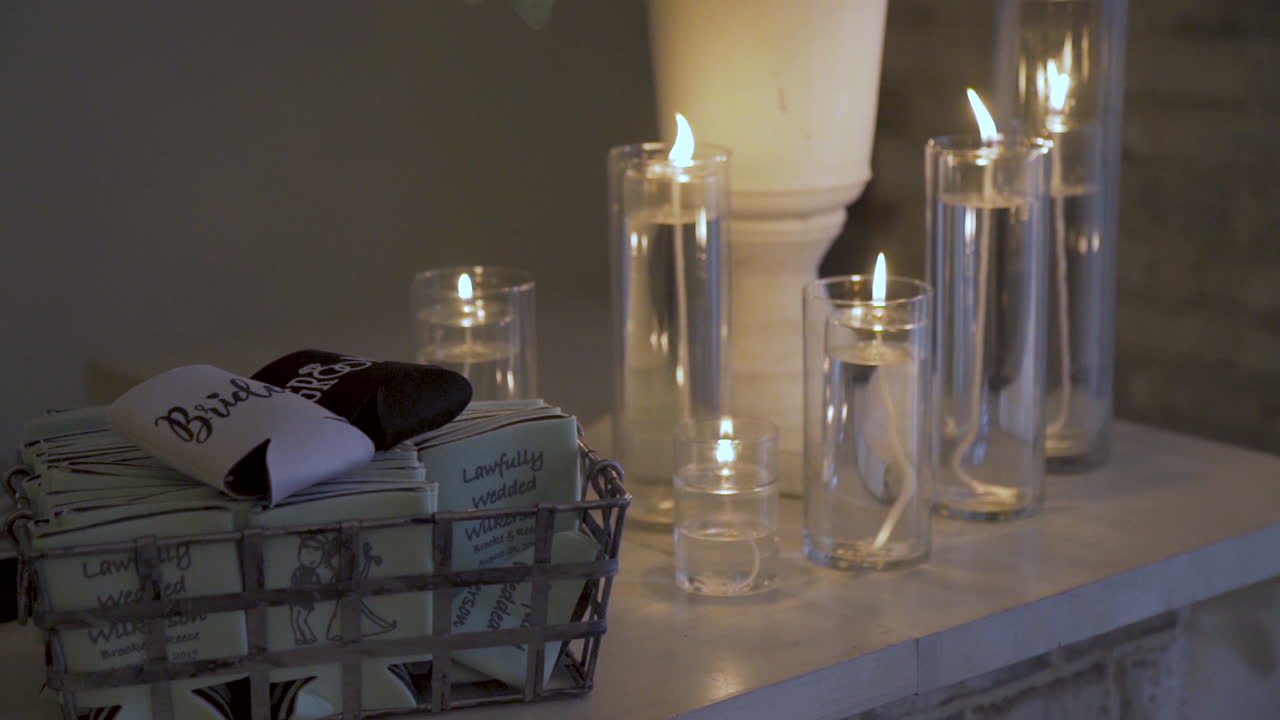 Romantic atmosphere oil candles burning for bride and groom