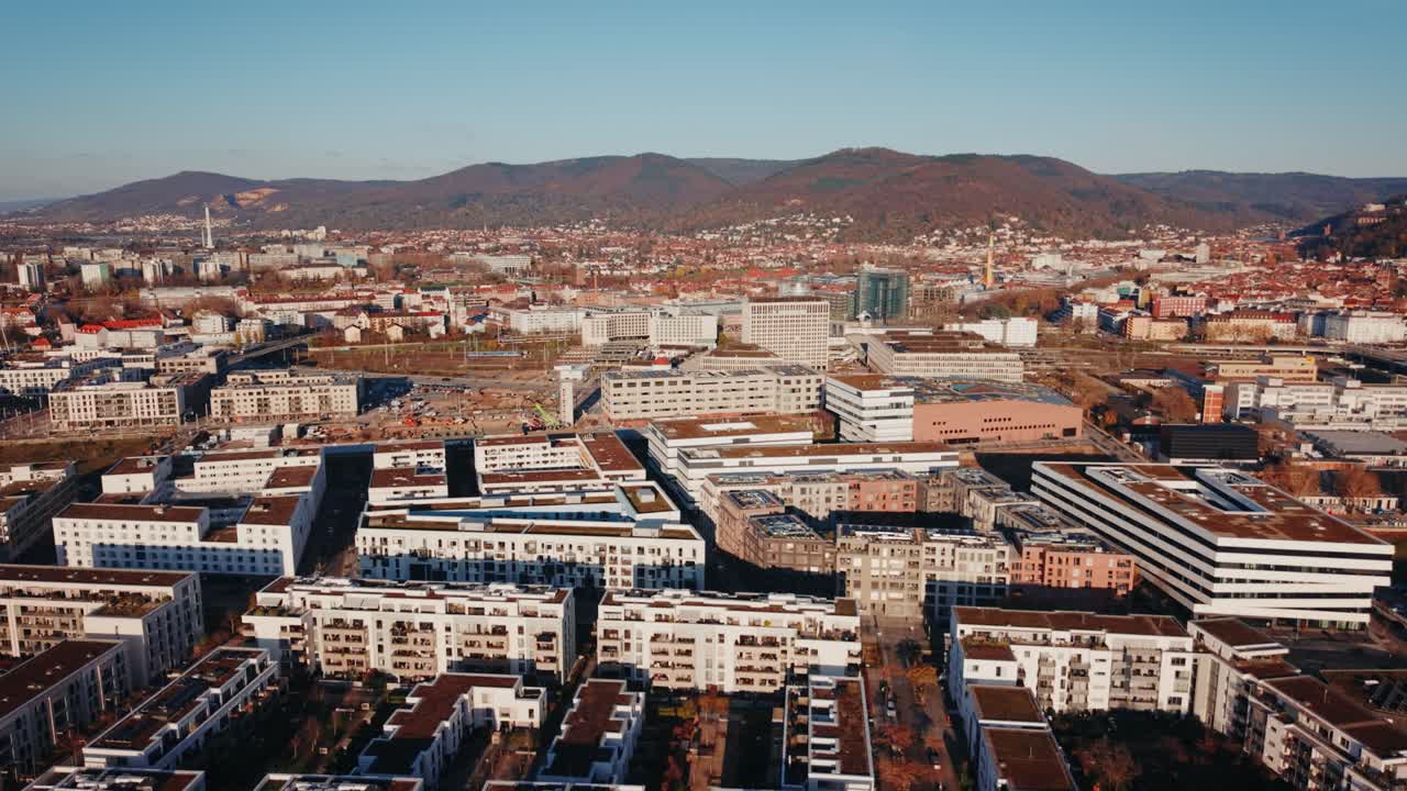 Infrastructure and Innovation: Detailed Aerial Shot of the Bahnstadt Bridge and the High-Rise Passive House Architecture in Heidelberg
